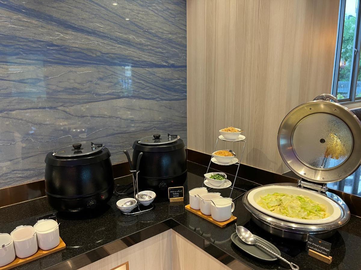 Fifth Pattaya Jomtien By Shiwalai Int Hotel Exterior photo A chafing dish with a lid
